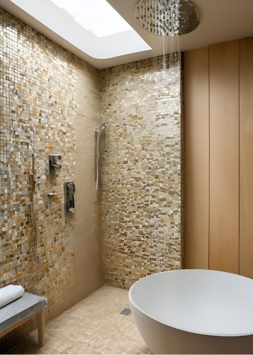 Wet Room Bathroom With A Stunning Overhead Rain Shower And Mosaic Tiled Walls